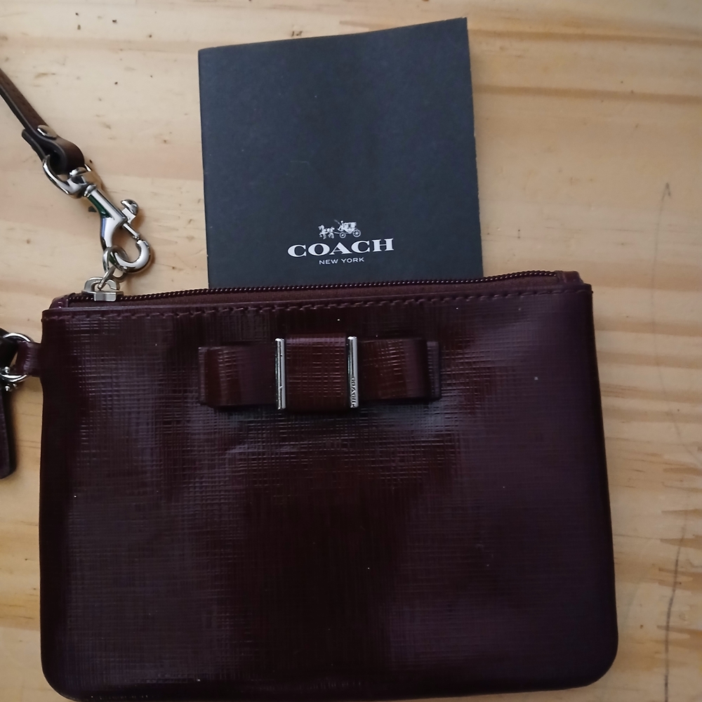 Coach Burgundy Wristlet with Bow Detail